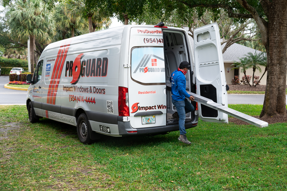 ProGuard technician working on a residential window installation